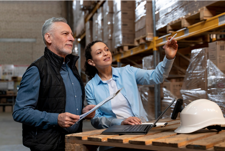 Entrepreneurs planning growth in a warehouse